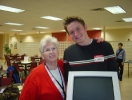 students-donating-larger-monitors-to-the-visually-impaired