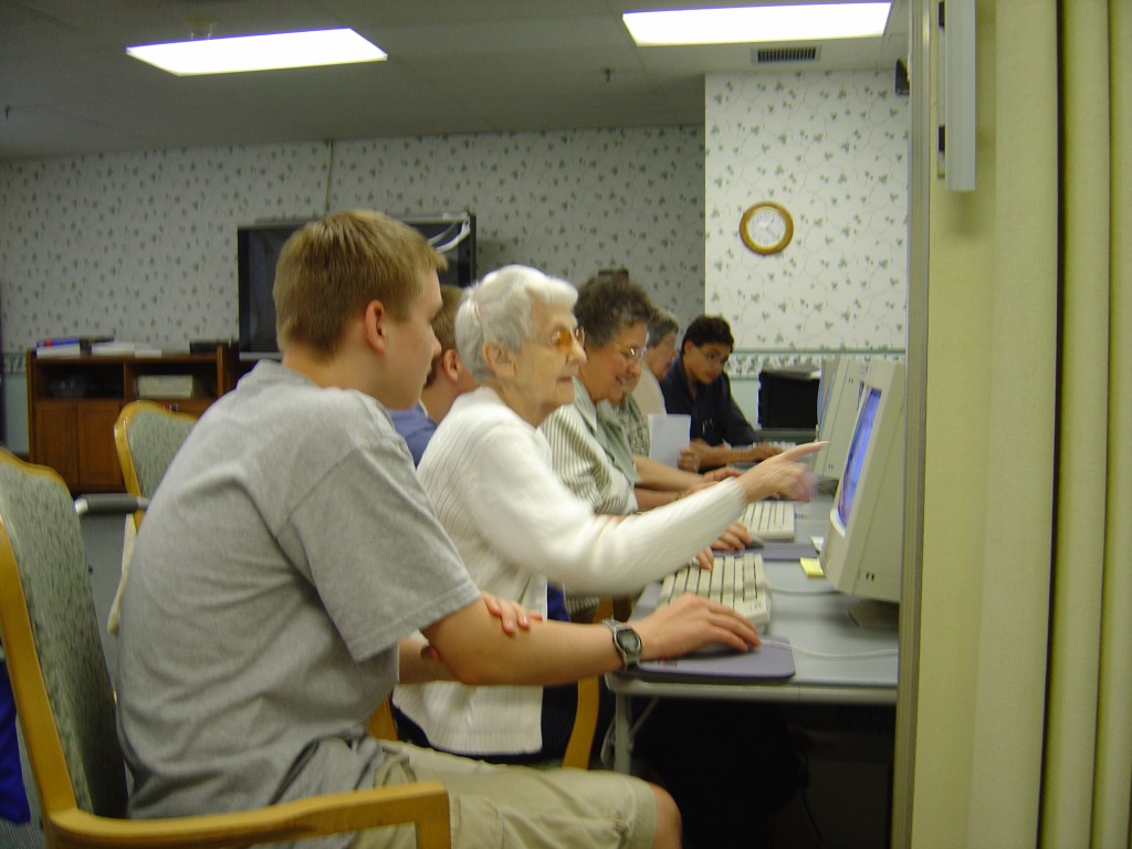 Volunteers teach in computer labs built in senior centers