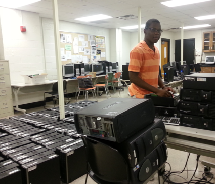 Student Vice Chair Dennis Bacon Loading Win 7 on Computers